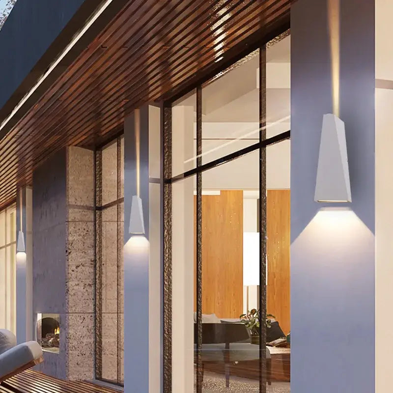 Modern white geometric wall light with a sleek angular design for decorbites led wall and outdoor garden use