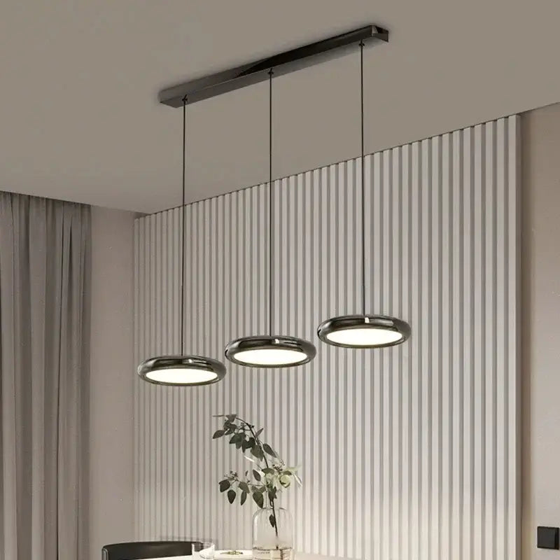 Modern black triple ring iron pendant chandelier with three illuminated circular shades for kitchen lighting decorbites iron pendant