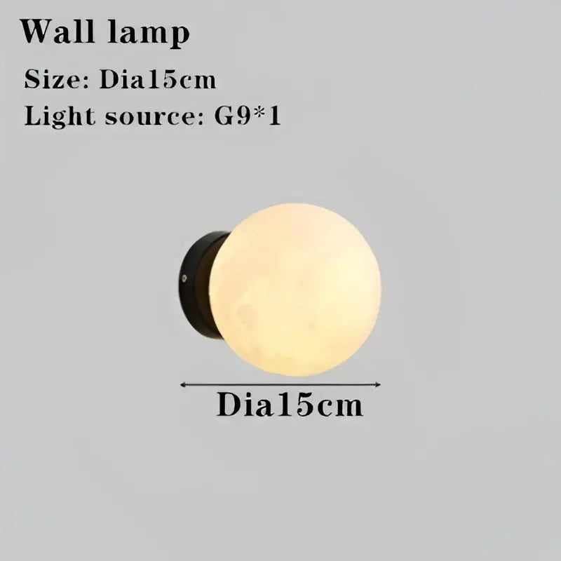Modern black tripod moon floor lamp with cream spherical wall lamp featuring g9 light source and 15cm diameter