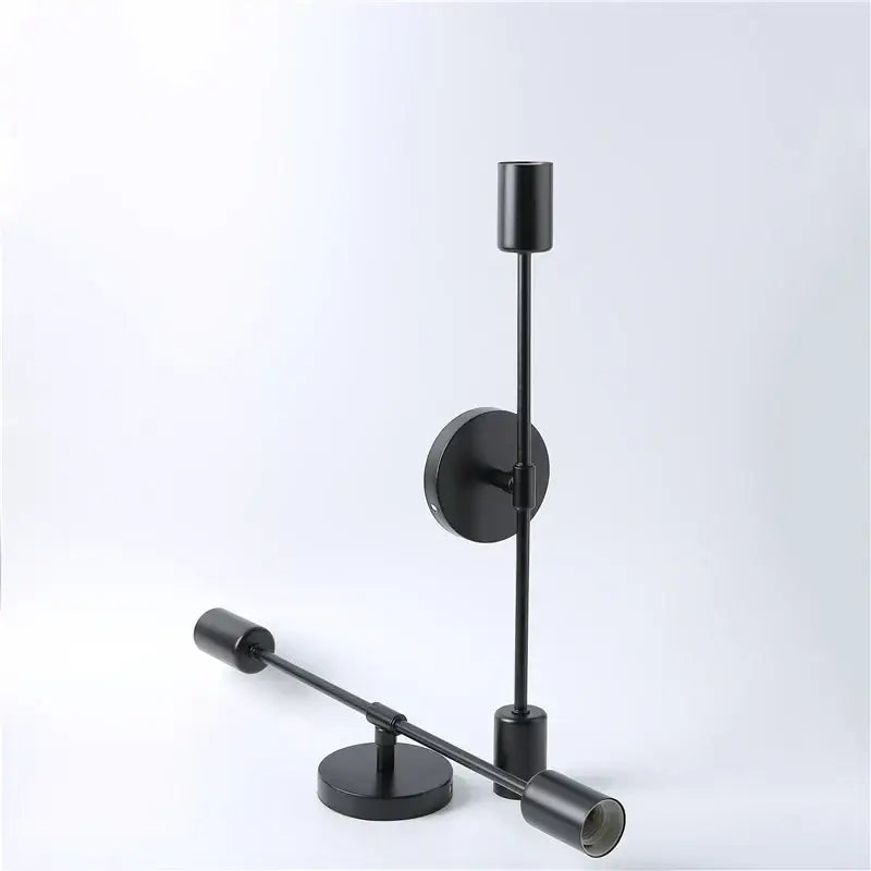 Modern black two arm led wall lamp with adjustable cylindrical fixtures for bedroom vanity lighting
