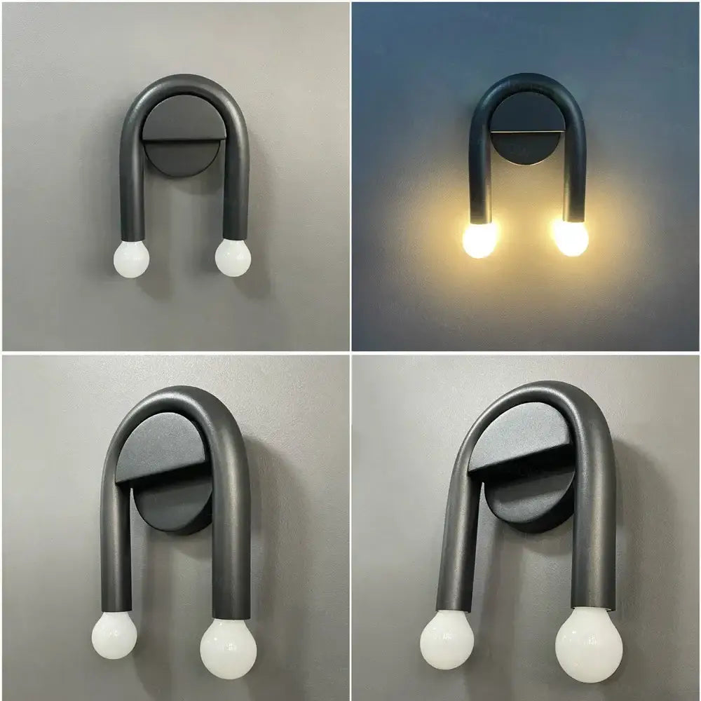Modern black u-shaped led wall lamp with two white spherical bulbs ideal for bedroom wall lighting