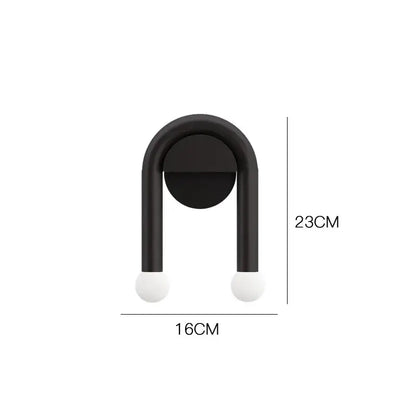 Modern black u-shape led wall lamp with white spherical bulbs, measuring 23cm height and 16cm width for bedroom use