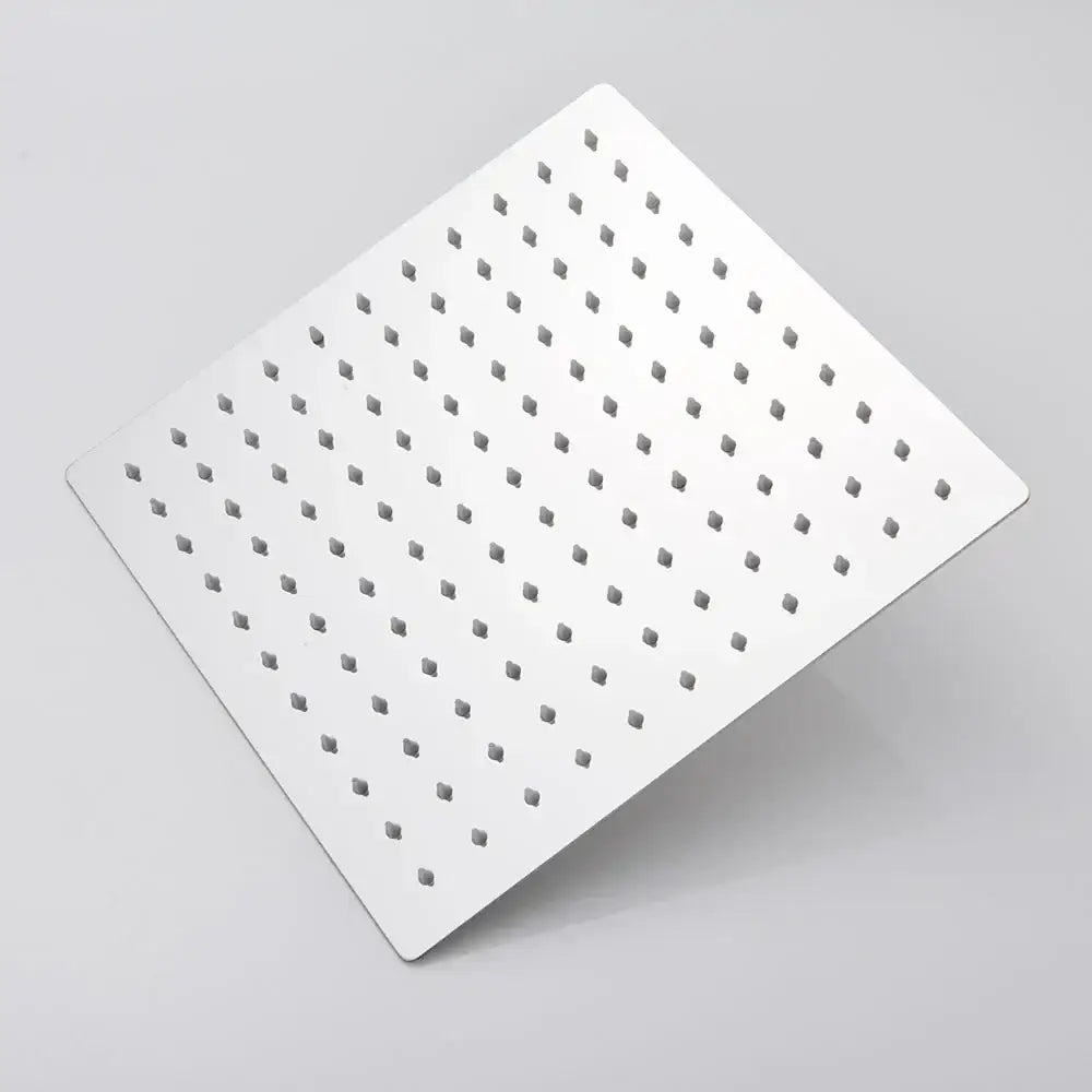 Modern black ultrathin rainfall shower head with square white perforated faceplate and hose for bathroom use
