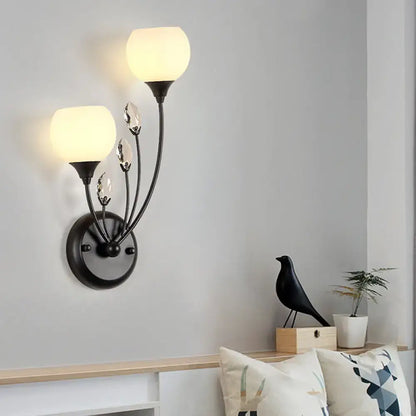 Modern black wall sconce light with frosted glass globes and crystal accents for living room wall lamp lighting
