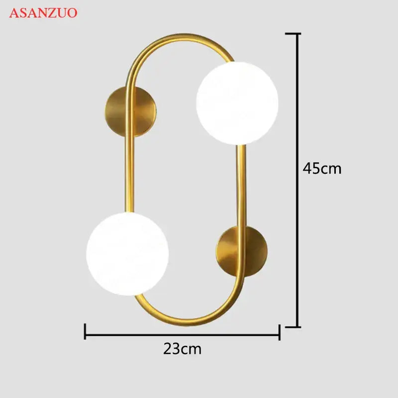Modern black wall sconce with brass led frame and frosted glass globes for bedroom decorbites brass led wall lighting