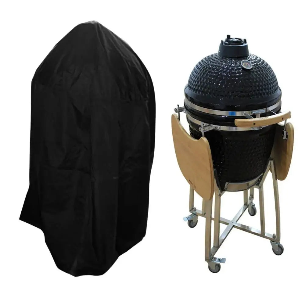 Modern black waterproof bbq grill cover shown with black ceramic kamado bbq grill with wooden side panels and steel legs