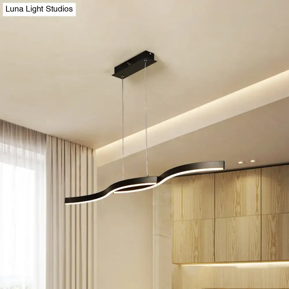 Modern black wave led hanging light fixture with sleek curved design and integrated lighting for kitchen use