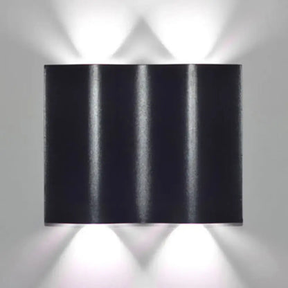 Modern black rectangular wall washer lamp with vertical ridges matte finish for warm white lighting on porch wall