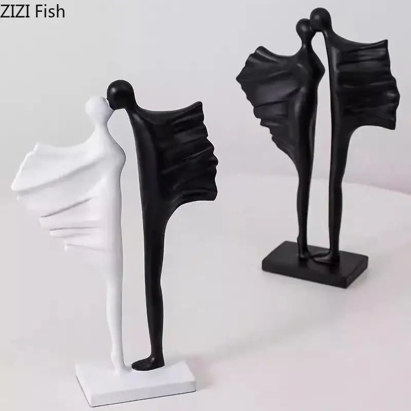 Modern black and white abstract lovers resin sculpture depicting two stylized figures in an intimate living room decorbites decorbites abstract lovers