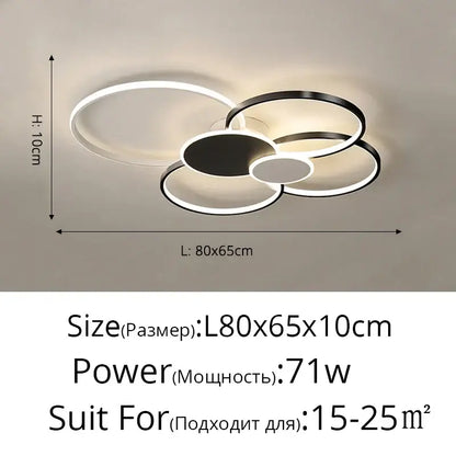 Modern black and white acrylic chandelier light with interlocking circular rings and sleek led design for living room