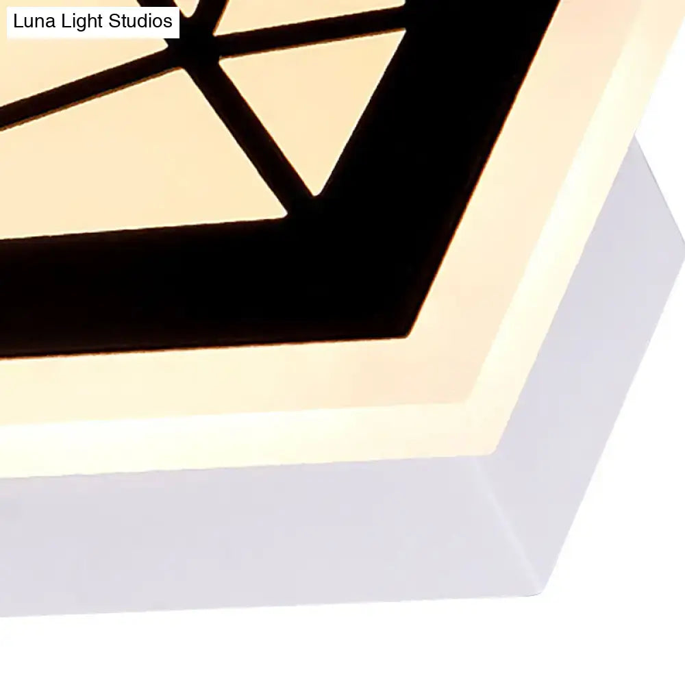 Modern black and white acrylic diamond bedside wall lamp with sleek white frame and black triangular accents light fixture