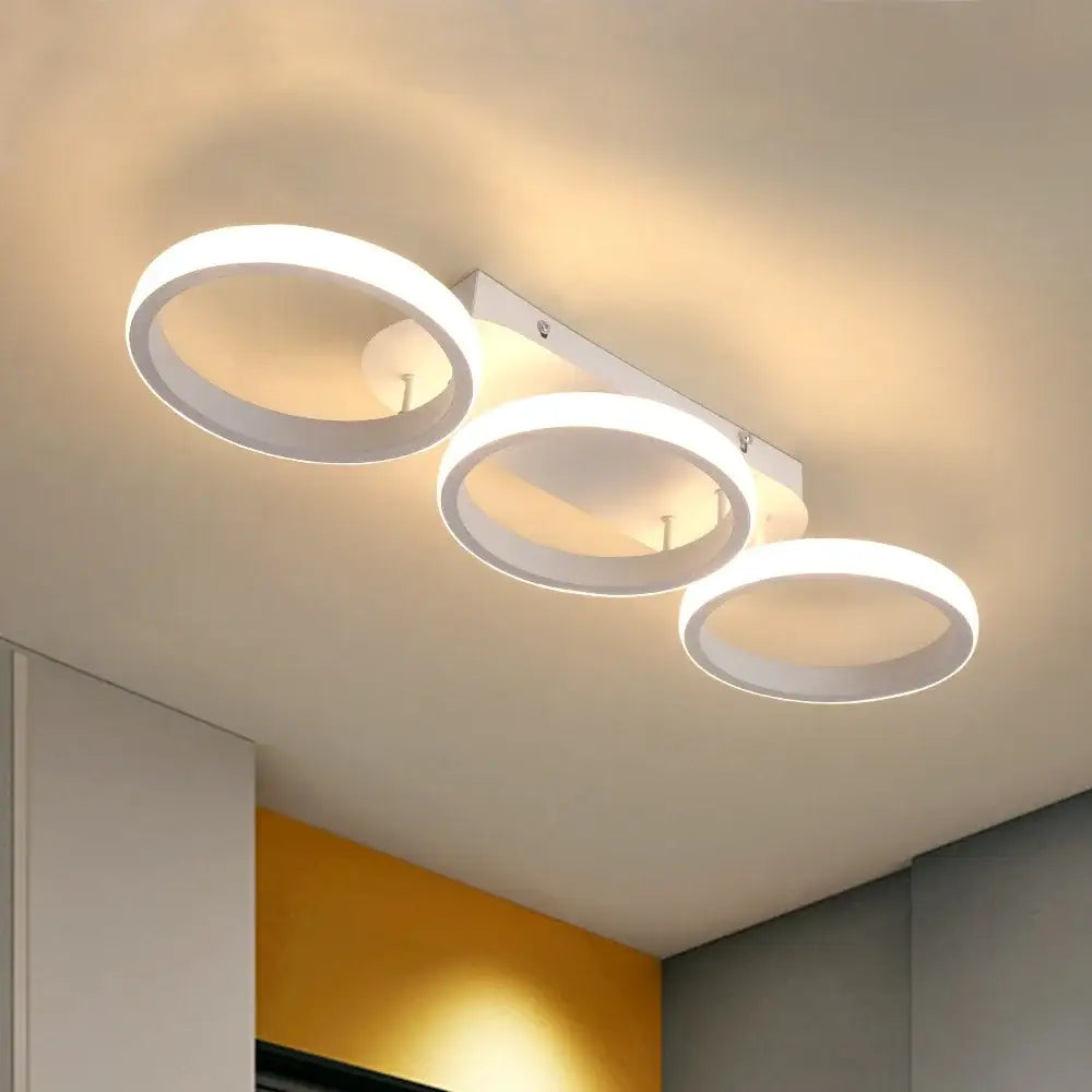 Modern black and white decorbites acrylic led ceiling lamp with three illuminated rings for living room decor