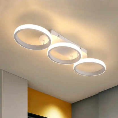 Modern black and white decorbites acrylic led ceiling lamp with three illuminated rings for living room decor