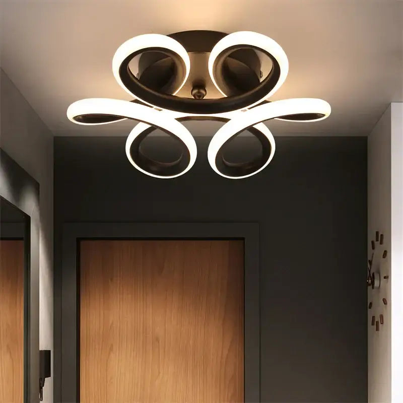 Modern black and white acrylic led ceiling light with swirling flower design for bedroom decorbites acrylic led ceiling decor