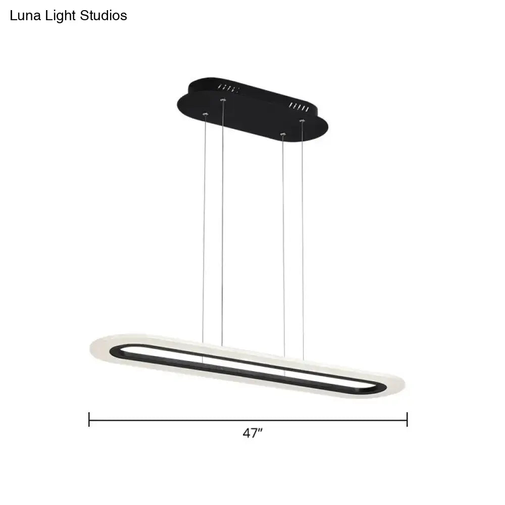 Modern black and white acrylic oblong light fixture with sleek minimalist design and remote control by DecorBites™
