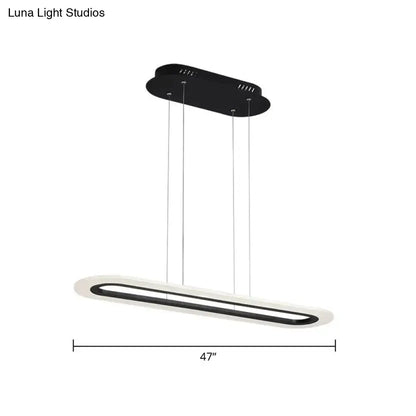Modern black and white acrylic oblong light fixture with sleek minimalist design and remote control by DecorBites™
