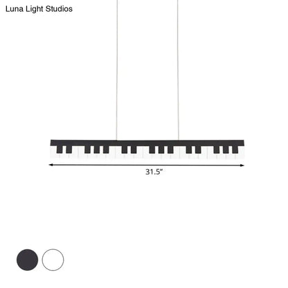 Black acrylic piano key chandelier lamp fixture by DecorBites modern LED ceiling light for kids rooms