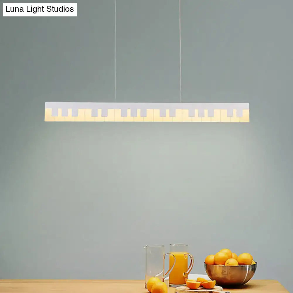 Modern acrylic piano key chandelier lamp fixture in white and gold designed for kids led ceiling light use