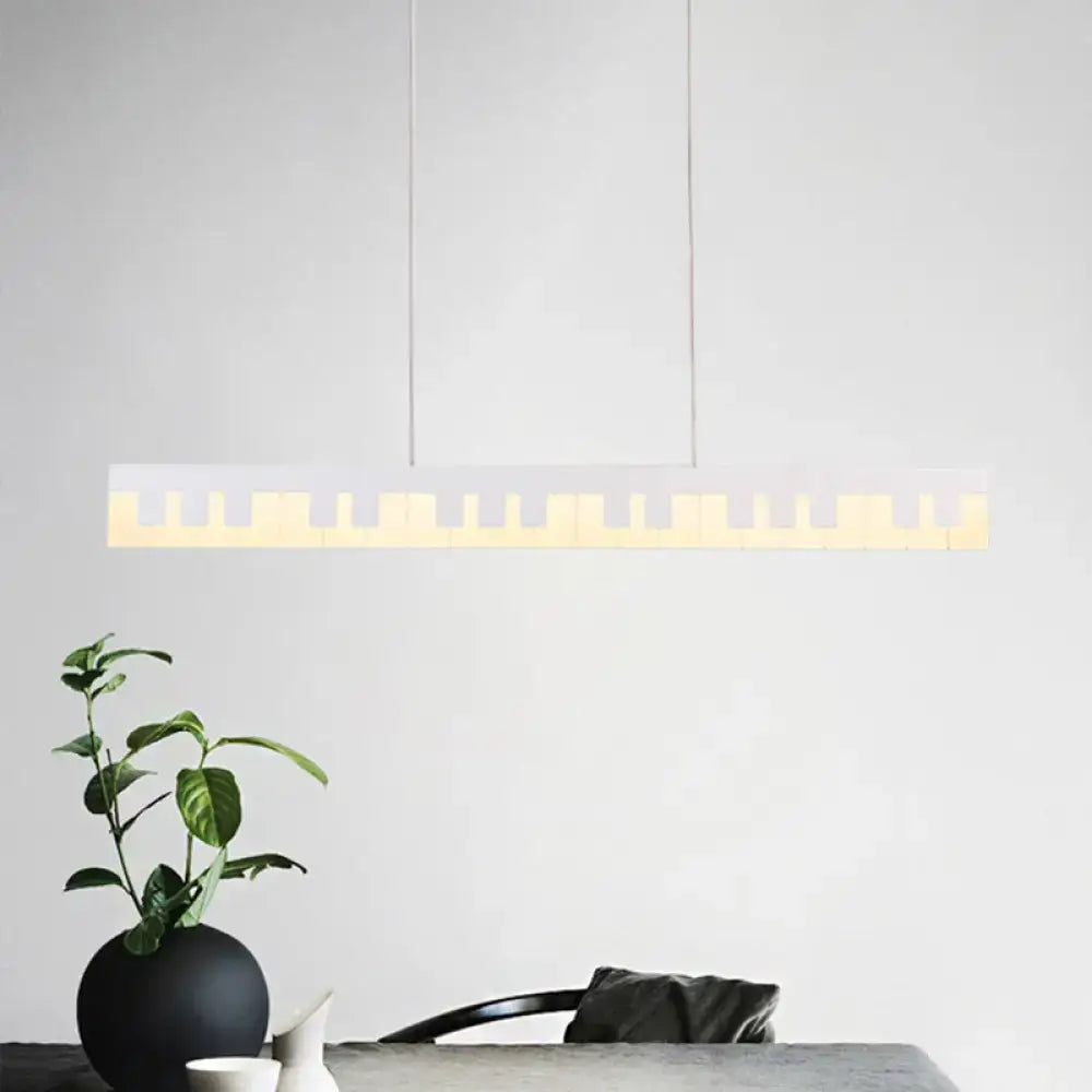 Decorbites modern acrylic piano key chandelier lamp fixture with sleek white body and warm led illumination