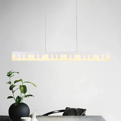 Decorbites modern acrylic piano key chandelier lamp fixture with sleek white body and warm led illumination