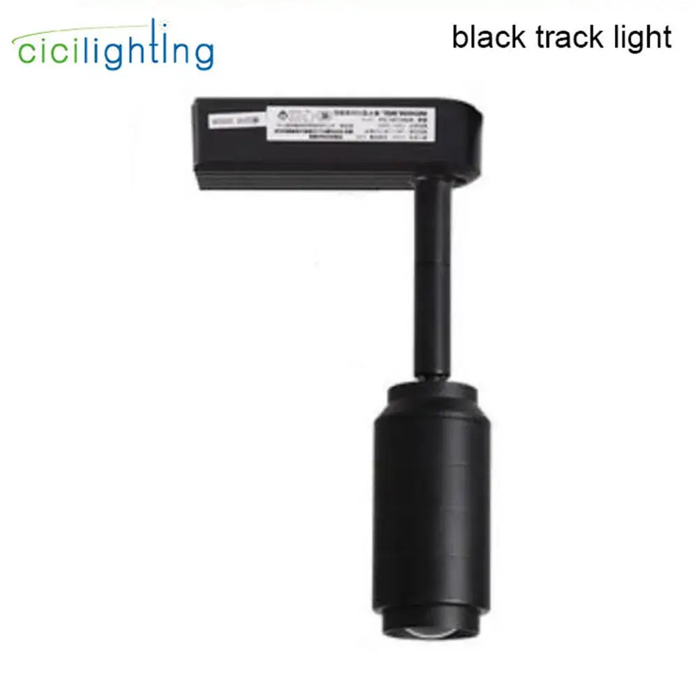 Modern black cylindrical track spotlight with matte finish and adjustable beam angle for versatile shop lighting