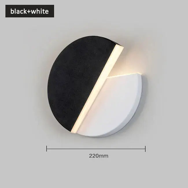 Modern black and white adjustable led wall lamp with a sleek circular design and glowing led strip for bedroom decorbites wall lamp