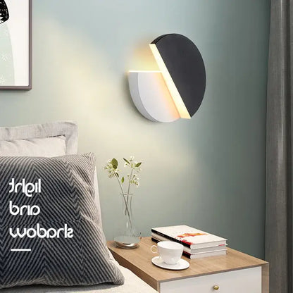 Modern black and white circular wall lamp with sleek minimalist design decorbites adjustable led wall bedroom sconce