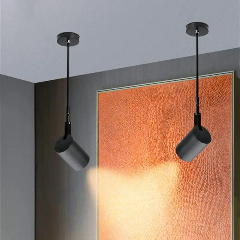 Modern black and white adjustable led wall lamp with sleek cylindrical design for bedroom decorbites adjustable led wall lighting