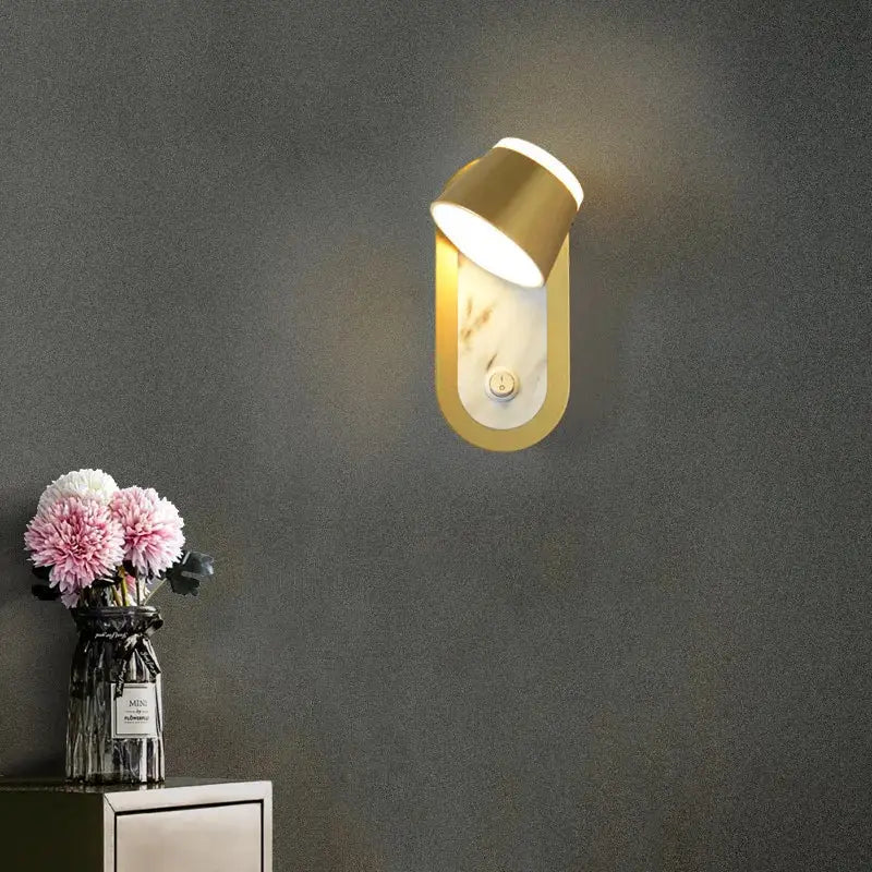 Gold-toned modern black and white decorbites adjustable wall lamp with marble accent and adjustable lamp head for bedroom lighting