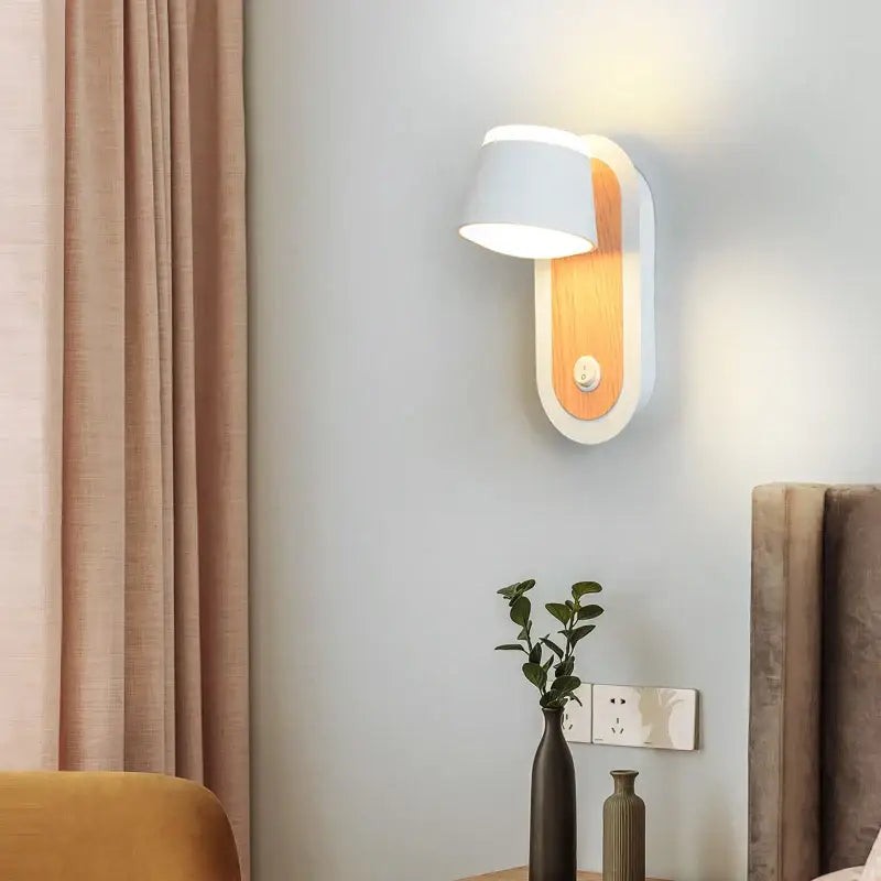 Modern black and white wall lamp with white matte finish wood accent and adjustable light head for bedroom decorbites adjustable wall lamp