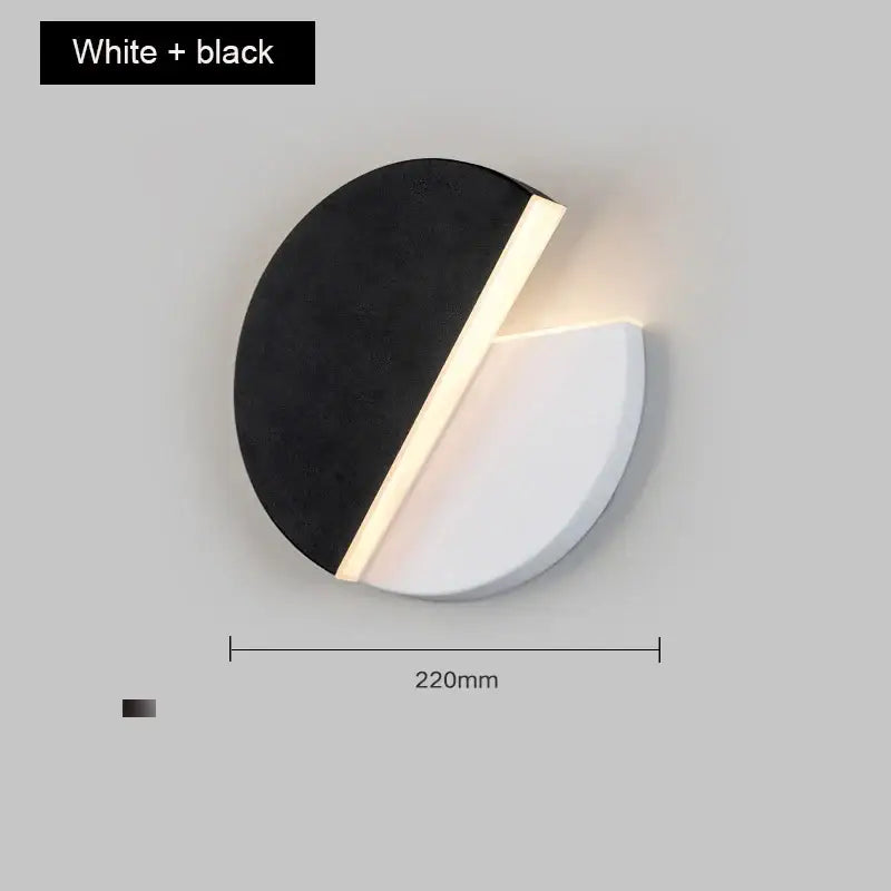 Modern black and white adjustable wall lamp with sleek circular design and warm led glow for bedroom reading light decorbites wall lamp