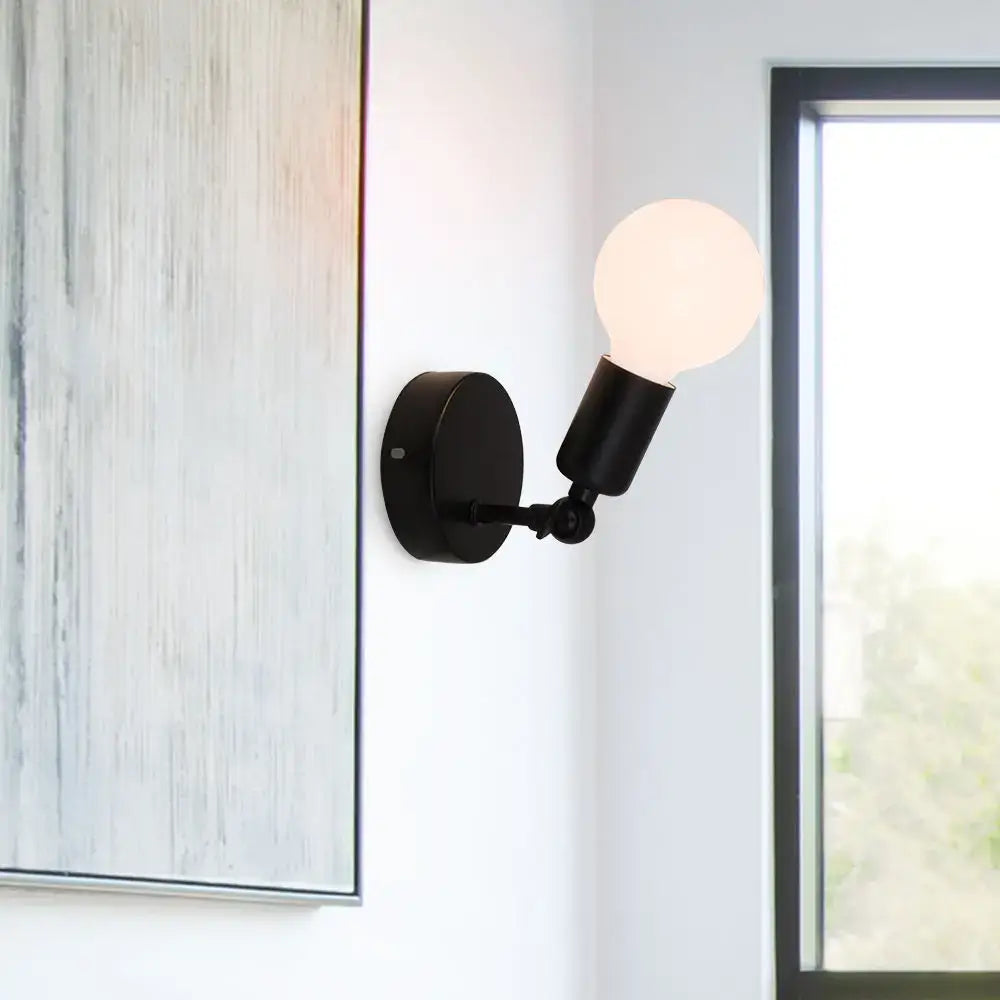 Modern black wall lamp holder with adjustable bracket and spherical frosted glass bulb for bedroom sconce lighting