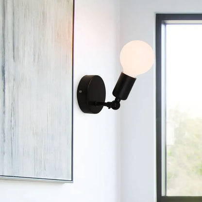 Modern black wall lamp holder with adjustable bracket and spherical frosted glass bulb for bedroom sconce lighting