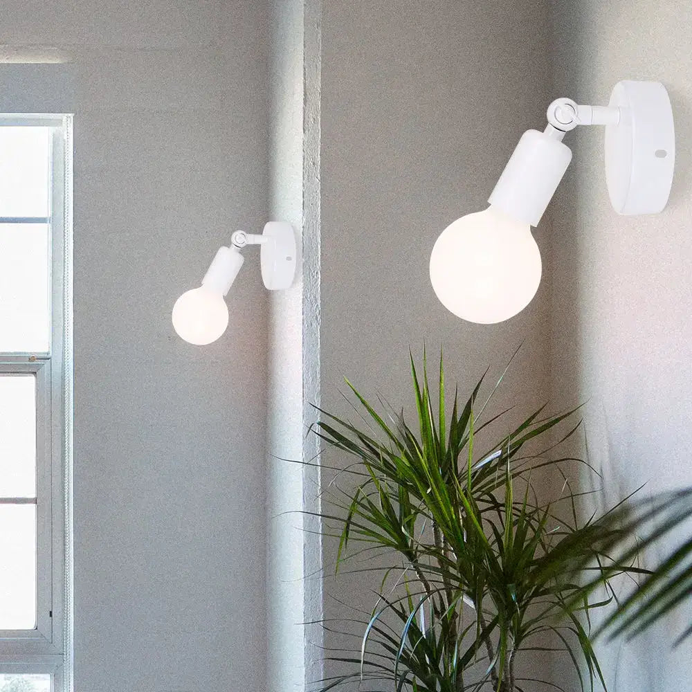 Modern black and white wall lamp holder with adjustable arm and spherical bulb suitable for bedroom sconce lighting