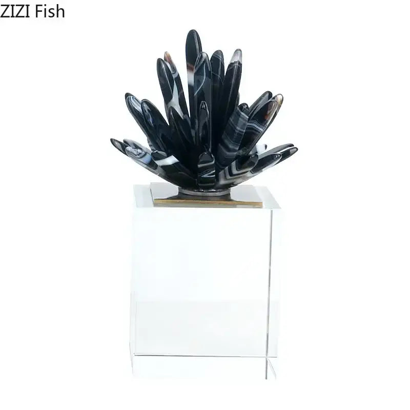 Modern black and white agate flower crystal art sculpture resembling a spiky cactus on clear acrylic pedestal for decor