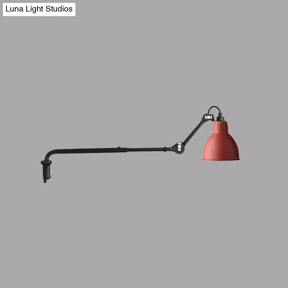 Modern black and white articulated bedroom wall lamp with red enamel lampshade mounted on direct wired electric arm
