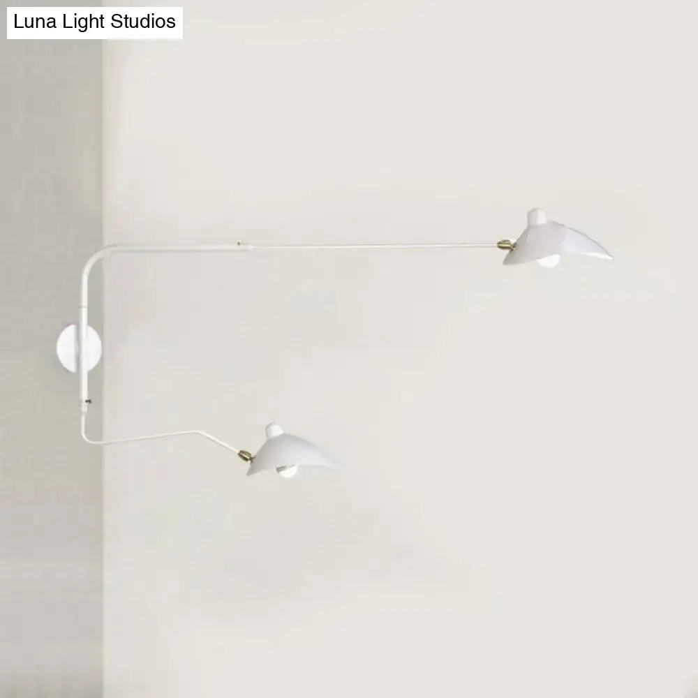 Modern black and white articulated wall sconce with two adjustable arms for living room light fixture