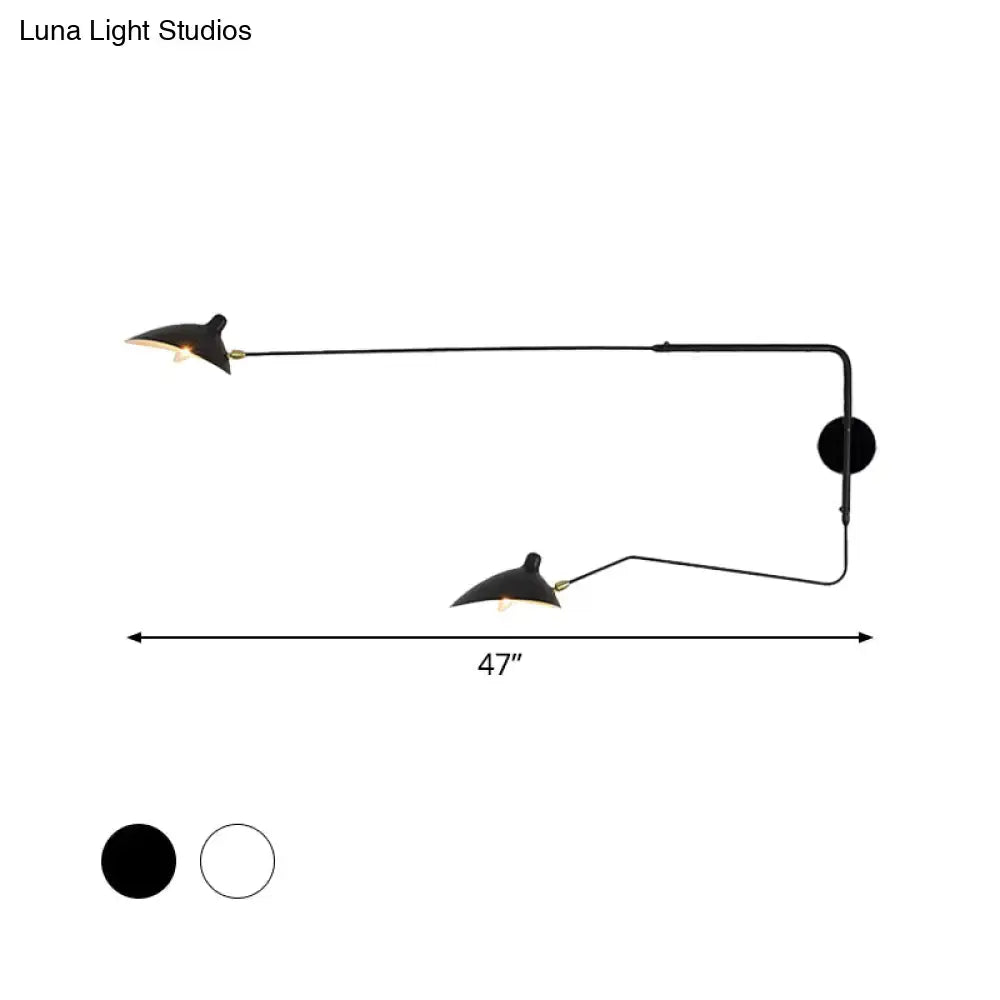 Modern black and white wall sconce light fixture with two articulated arms for living room illumination