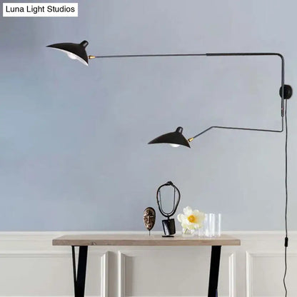 Modern black wall sconce with dual articulated arms minimalist light fixture for living room use