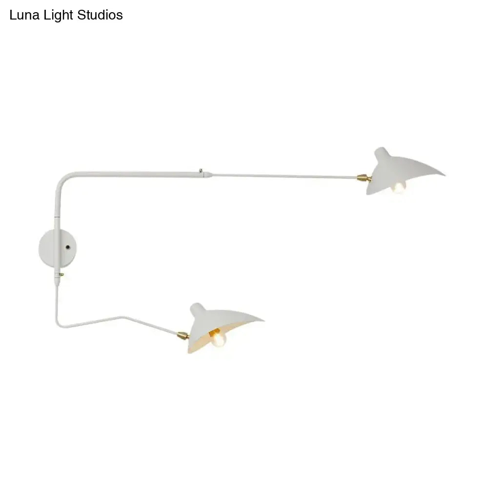 Modern black and white dual-arm wall sconce with gold accents minimalist light fixture for living room use