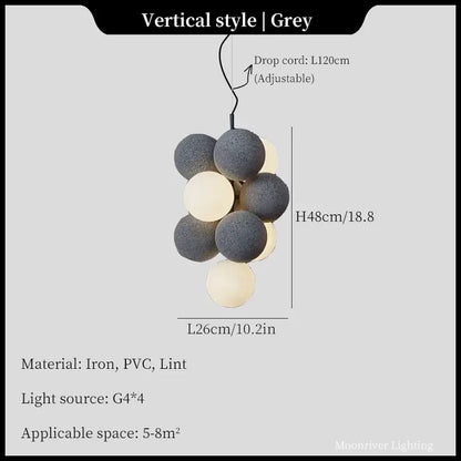Modern black and white ball led ceiling chandelier with textured dark grey and cream spherical bulbs on iron cord