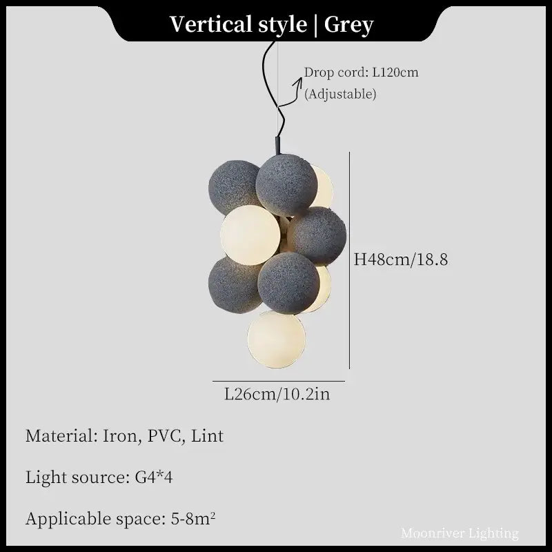 Modern black and white ball led ceiling chandelier with textured dark grey and cream spherical bulbs on iron cord