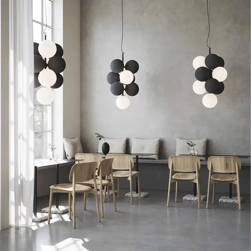 Modern black and white ball led ceiling chandelier featuring spherical pendant lights in a clustered design for kitchen use