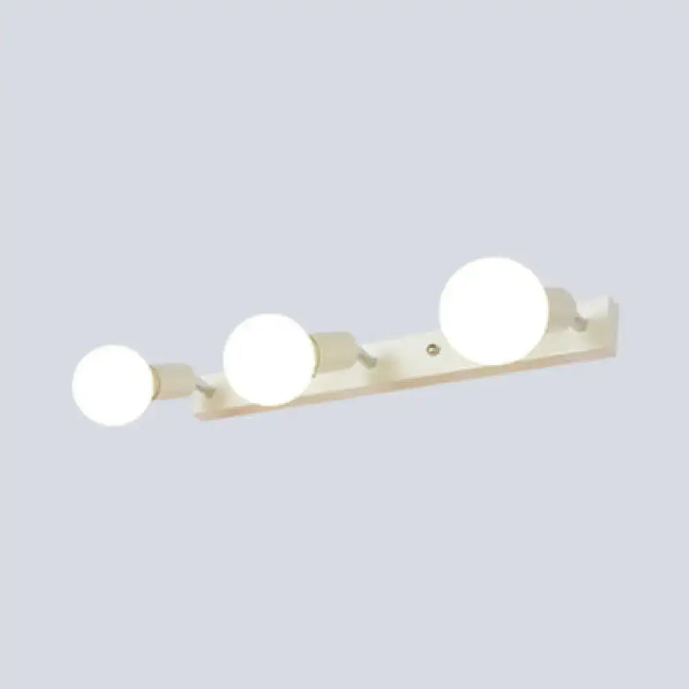 Off-white rectangular wall-mounted bedroom vanity light with three spherical frosted exposed bulbs in black white design
