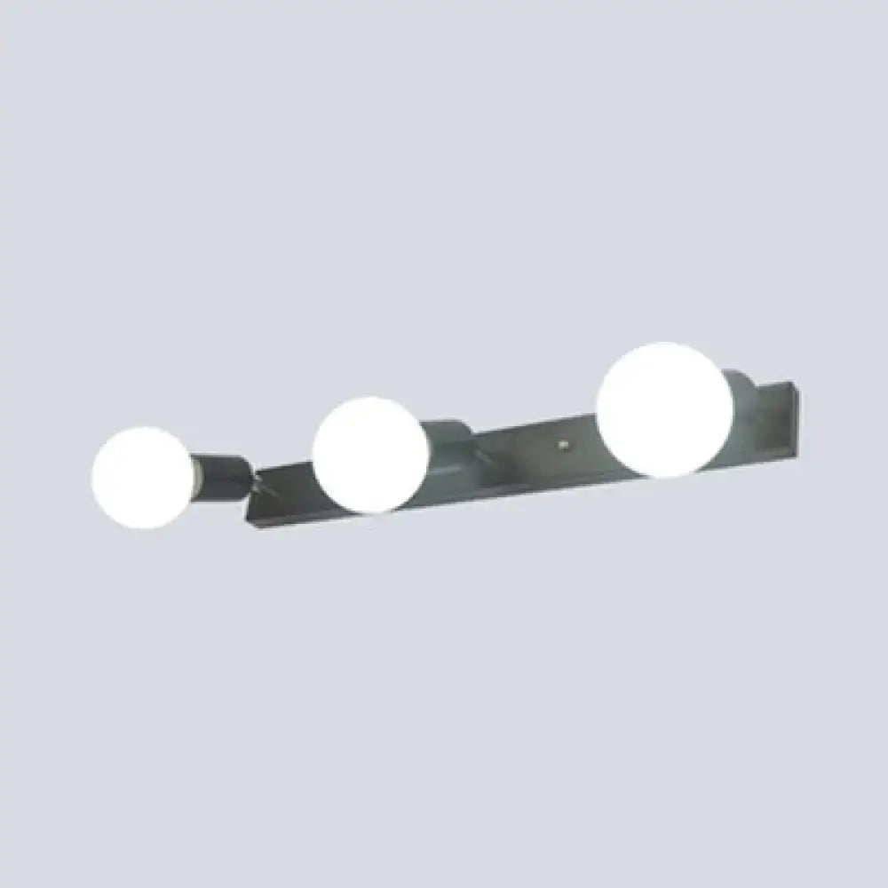 Modern black and white bedroom vanity light with exposed bulbs and three spherical white bulbs wall-mounted design