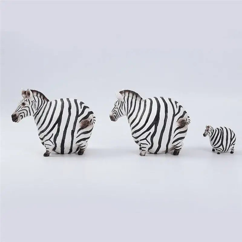 Modern black and white big belly zebra resin sculpture set with three chubby striped belly zebra figurines for decorbites living room decor