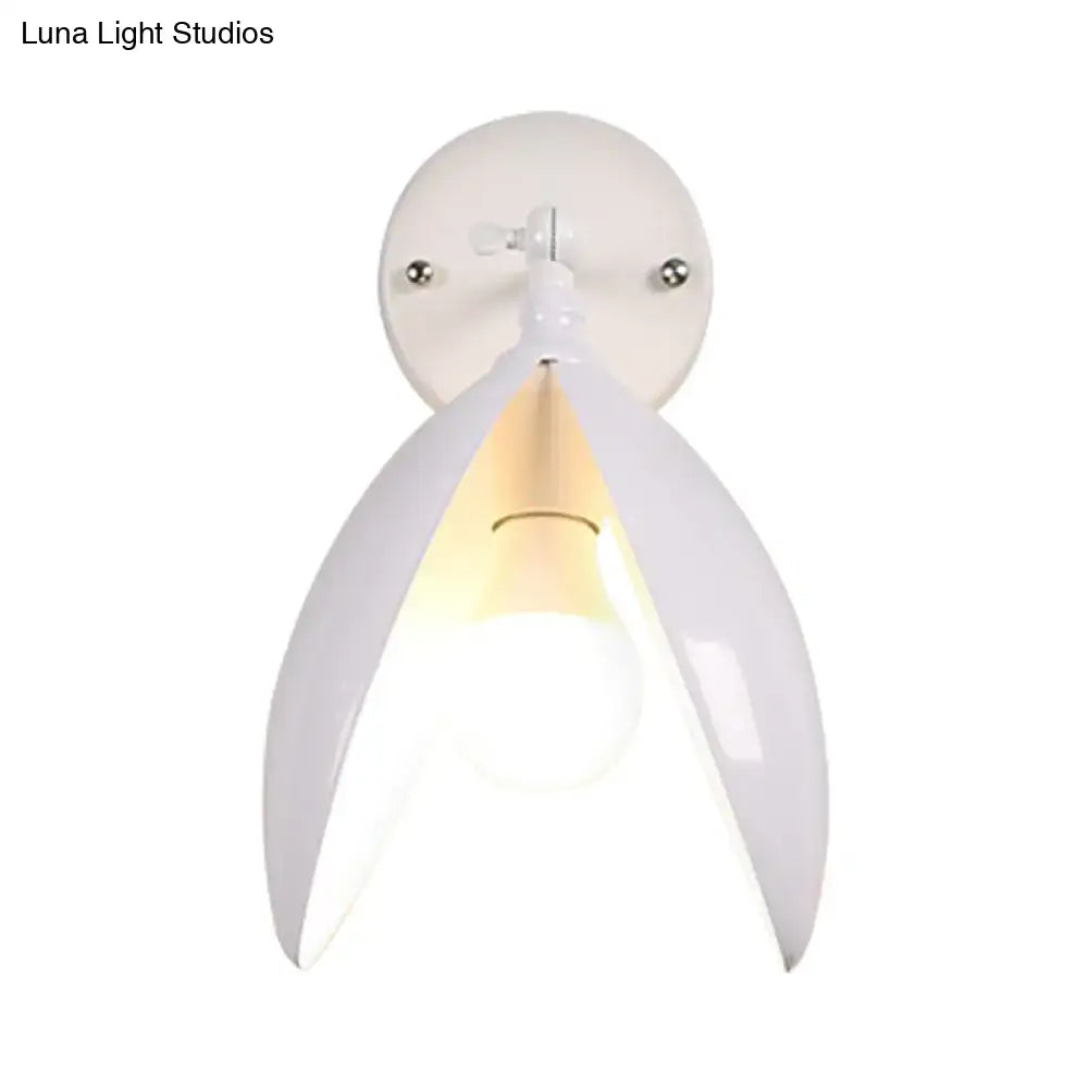 White ceramic wall light with sleek petal-like design for modern black and white blooming bud wall living room sconce