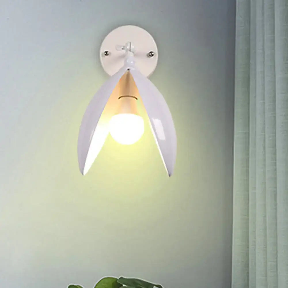 White ceramic wall light with petal design and warm bulb for modern black and white blooming bud wall light living room use