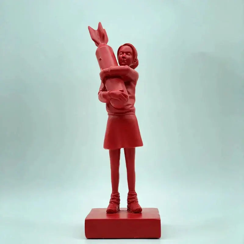 Red resin bomb hugger girl sculpture holding a rocket modern black and white decorbites bomb hugger statue
