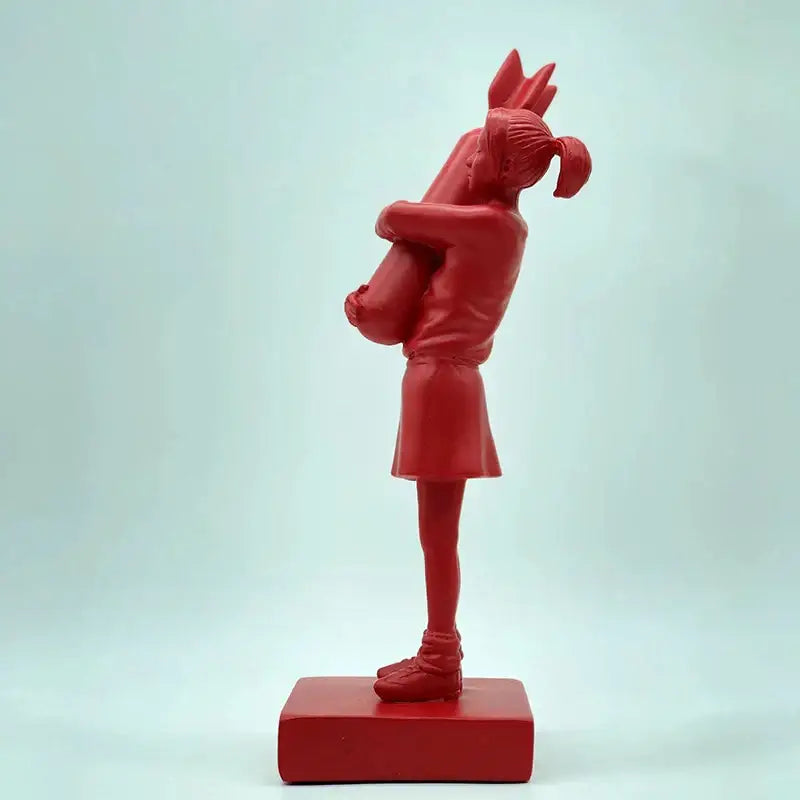 Red plastic decorbites bomb hugger girl resin statue hugging another figure with hair tied up for living room decor